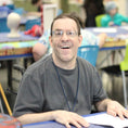 Load image into Gallery viewer, Artist Joey K. enjoying art class