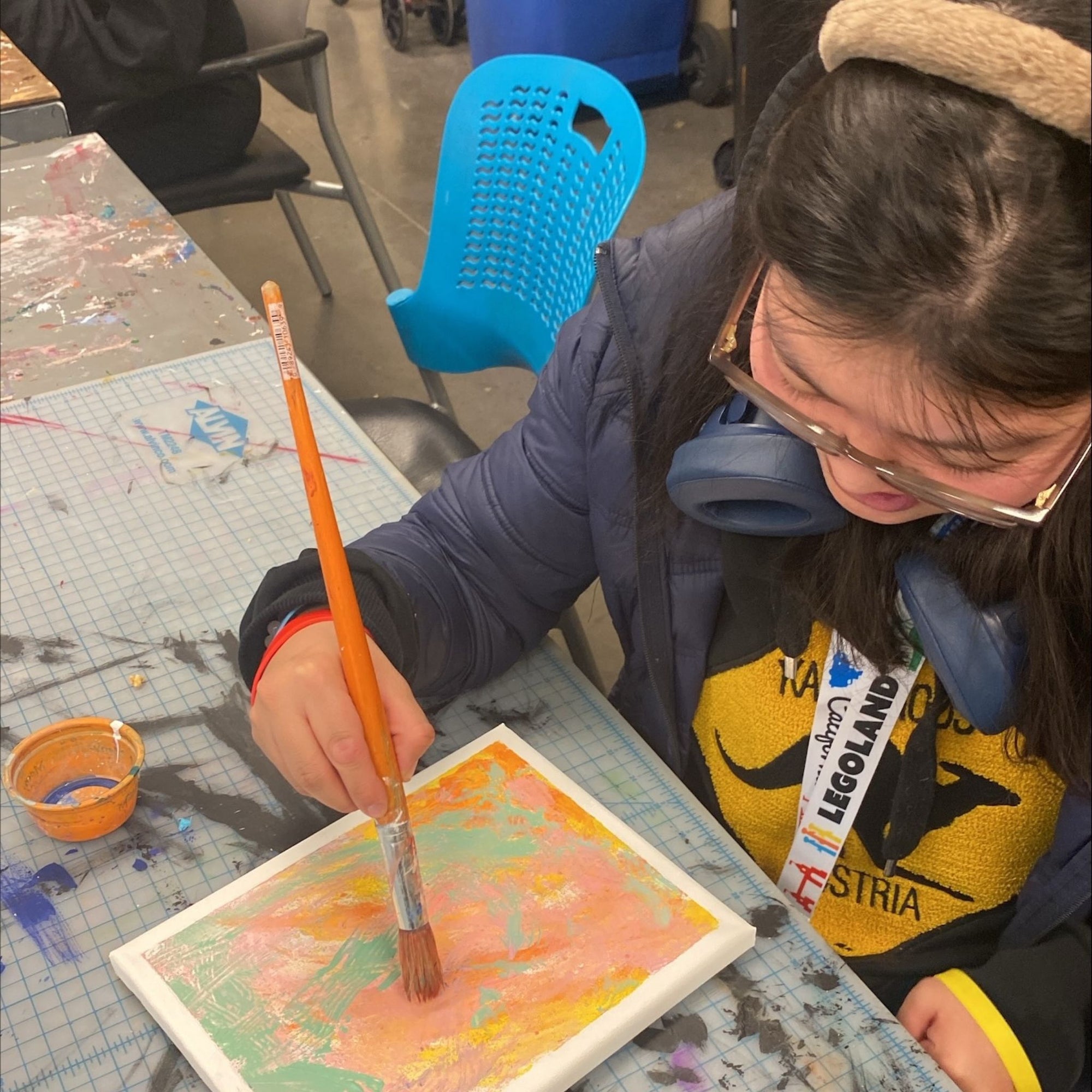 Tonichelle M. painting abstract artwork at OV Artworks Studio